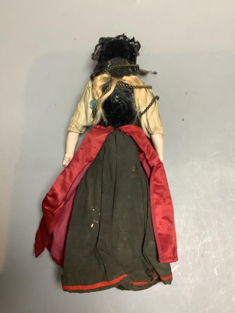 A costume doll, bisque shouler plate, height 25cm